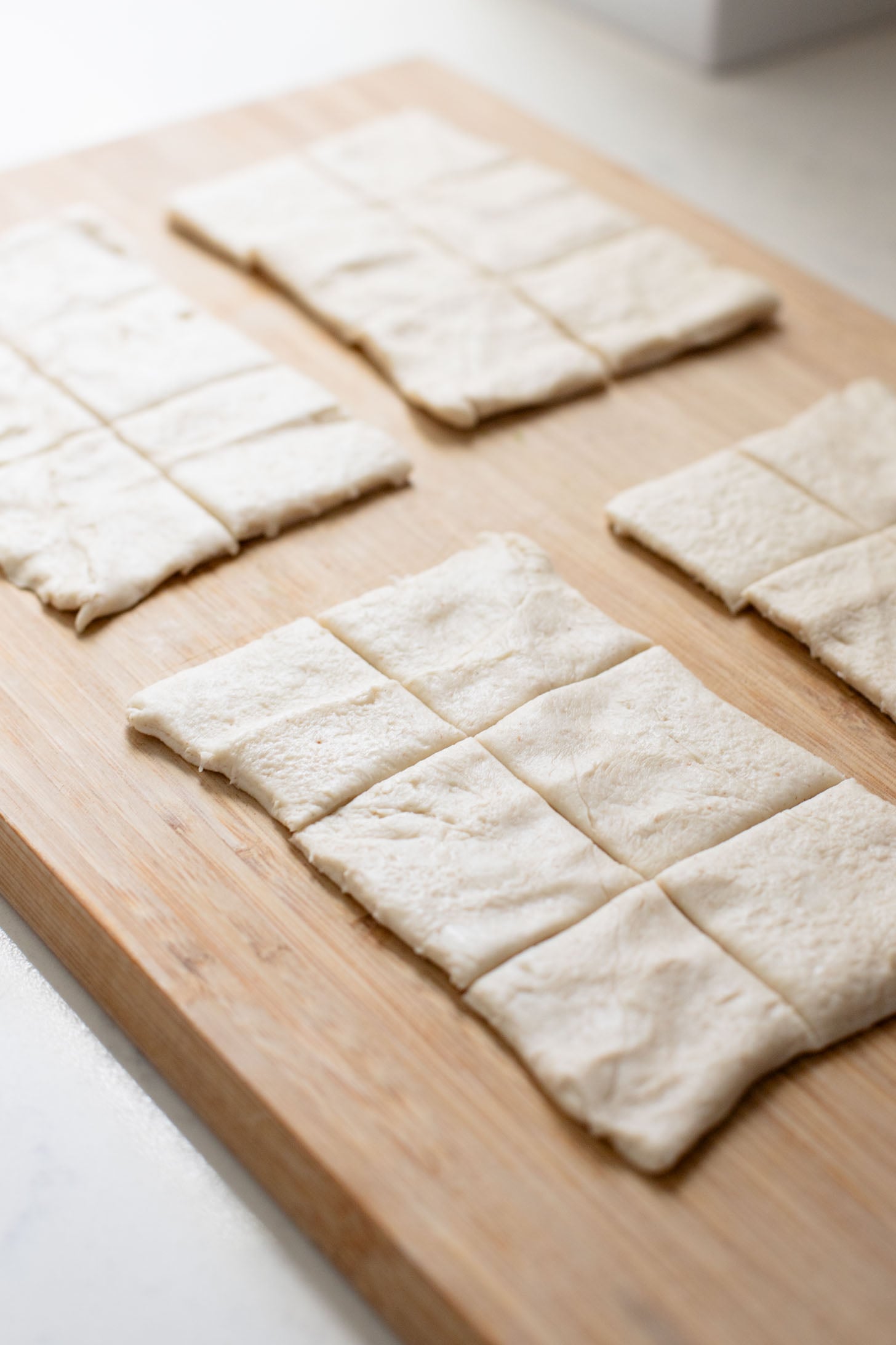 These Spinach Dip Crescent Bites are the perfect vegan holiday appetizer! Bite-sized and dairy-free, these are easy & tasty | ThisSavoryVegan.com