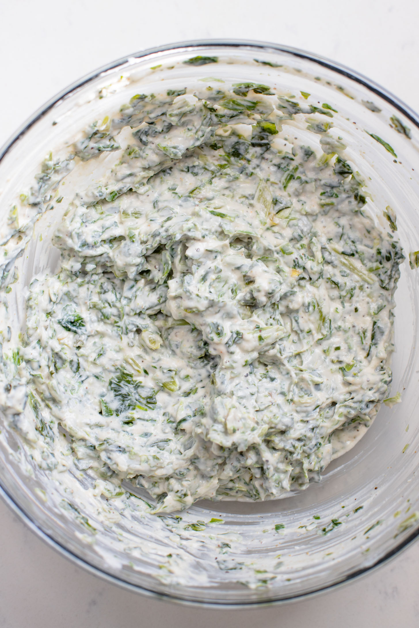 These Spinach Dip Crescent Bites are the perfect vegan holiday appetizer! Bite-sized and dairy-free, these are easy & tasty | ThisSavoryVegan.com