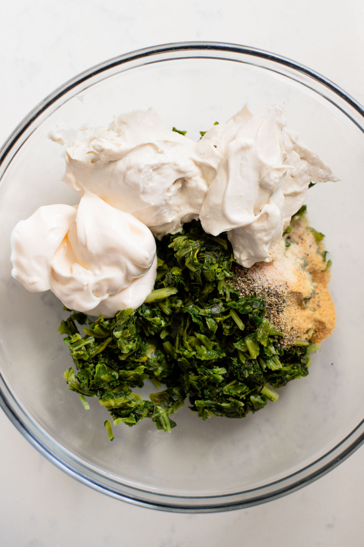 These Spinach Dip Crescent Bites are the perfect vegan holiday appetizer! Bite-sized and dairy-free, these are easy & tasty | ThisSavoryVegan.com