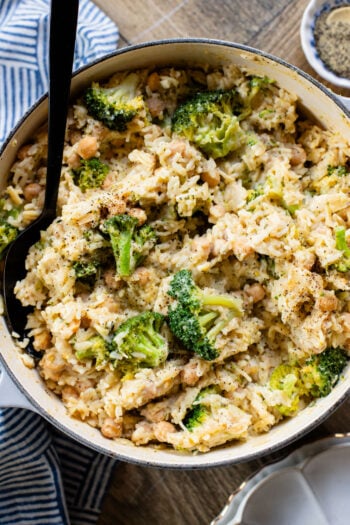 This Creamy Broccoli & Rice is a one-pot vegan dinner that is filled with chickpeas, rice, broccoli and a creamy non-dairy sauce | ThisSavoryVegan.com