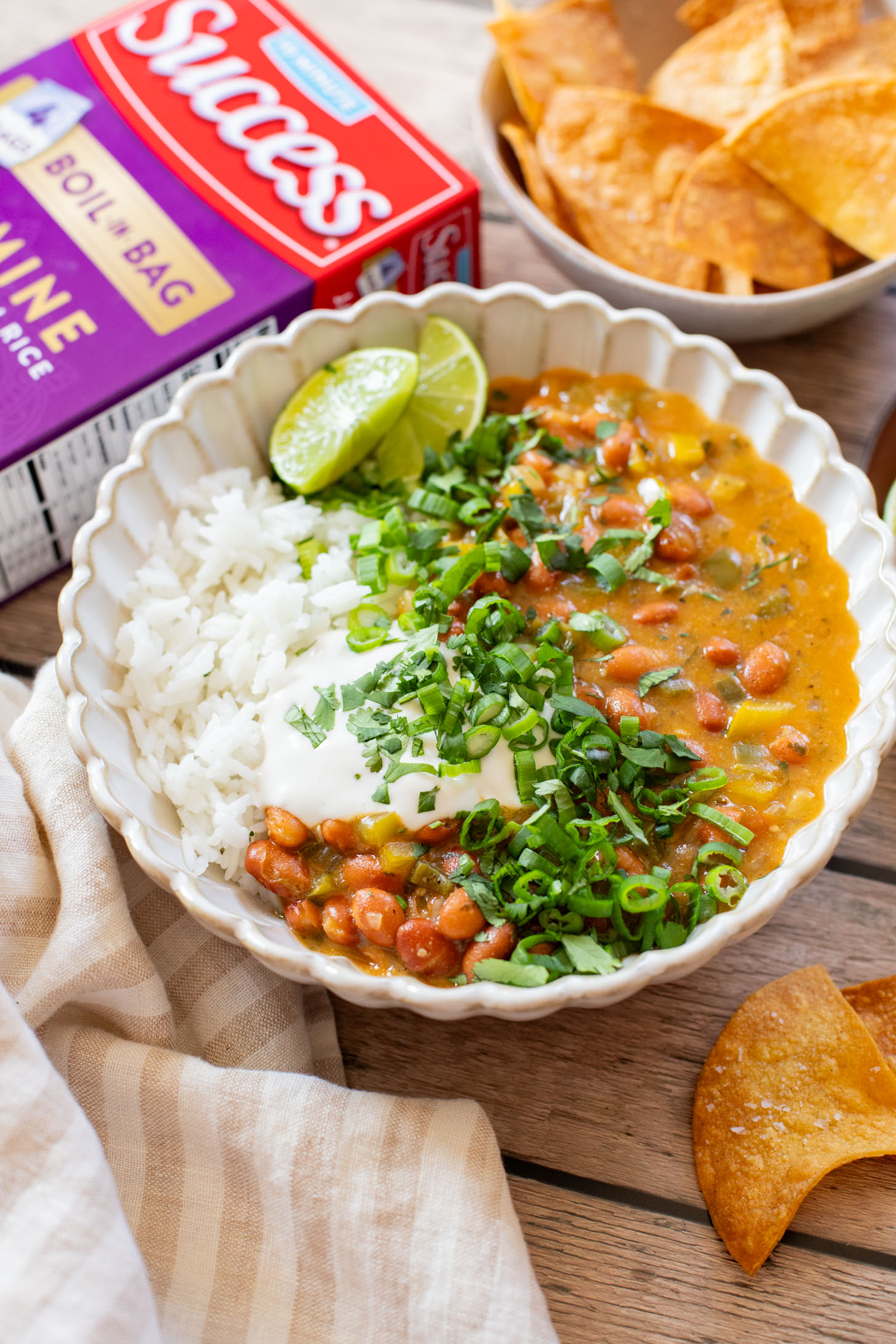 This Creamy Salsa Verde Chili is an easy one-pot weeknight dinner. Served over rice for a complete meal in 30 minutes | ThisSavoryVegan.com