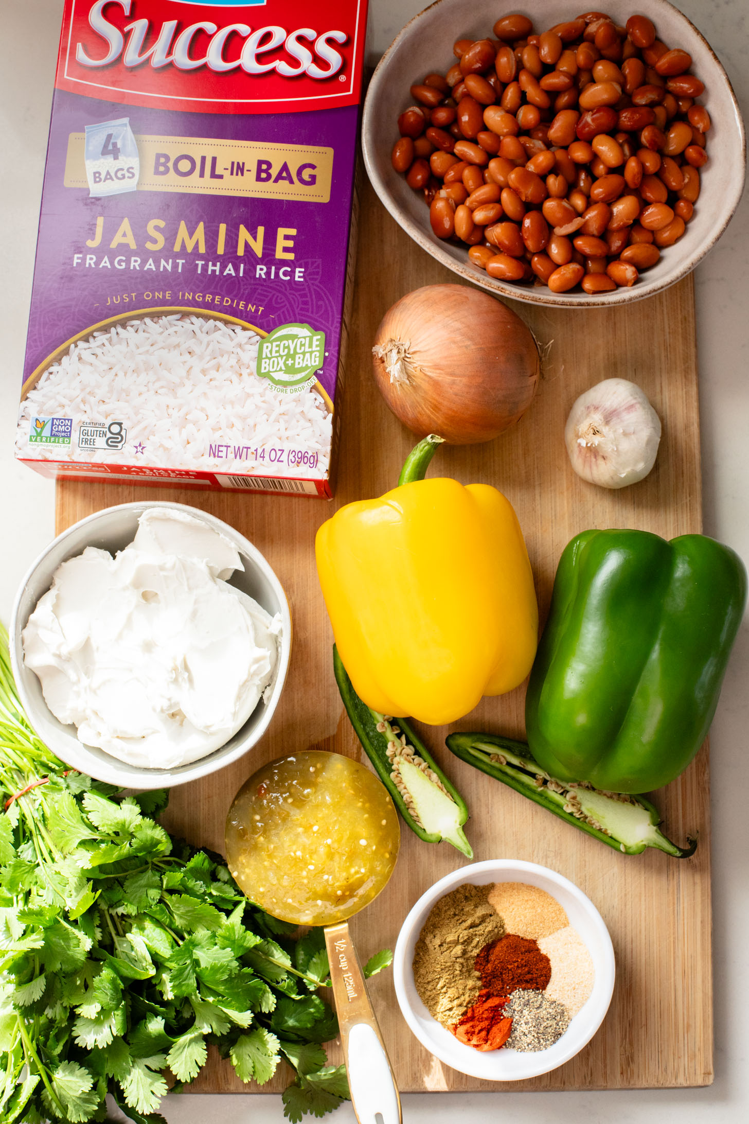 This Creamy Salsa Verde Chili is an easy one-pot weeknight dinner. Served over rice for a complete meal in 30 minutes | ThisSavoryVegan.com