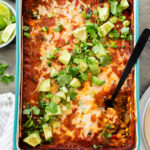 This Quinoa Enchilada Casserole is filled with plant-based protein & veggies. A super easy weeknight dinner that doesn't lack on flavor | ThisSavoryVegan.com