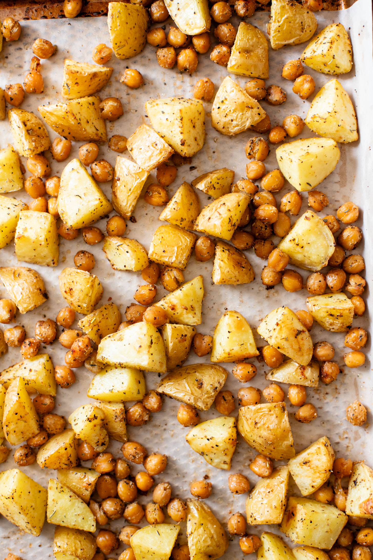 These Roasted Potato & Chickpea Bowls are a simple vegan dinner! Served over cauliflower rice with a dairy-free jalapeño ranch | ThisSavoryVegan.com
