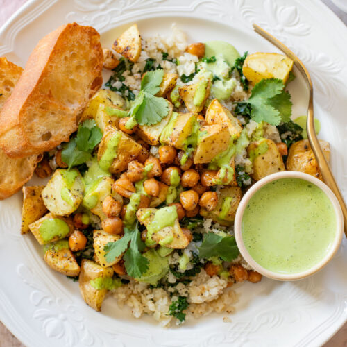 These Roasted Potato & Chickpea Bowls are a simple vegan dinner! Served over cauliflower rice with a dairy-free jalapeño ranch | ThisSavoryVegan.com