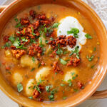 Comforting & cozy, this Salsa Verde Gnocchi Soup is packed with veggies, soy chorizo and tender gnocchi. Plant-based & delicious | ThisSavoryVegan.com