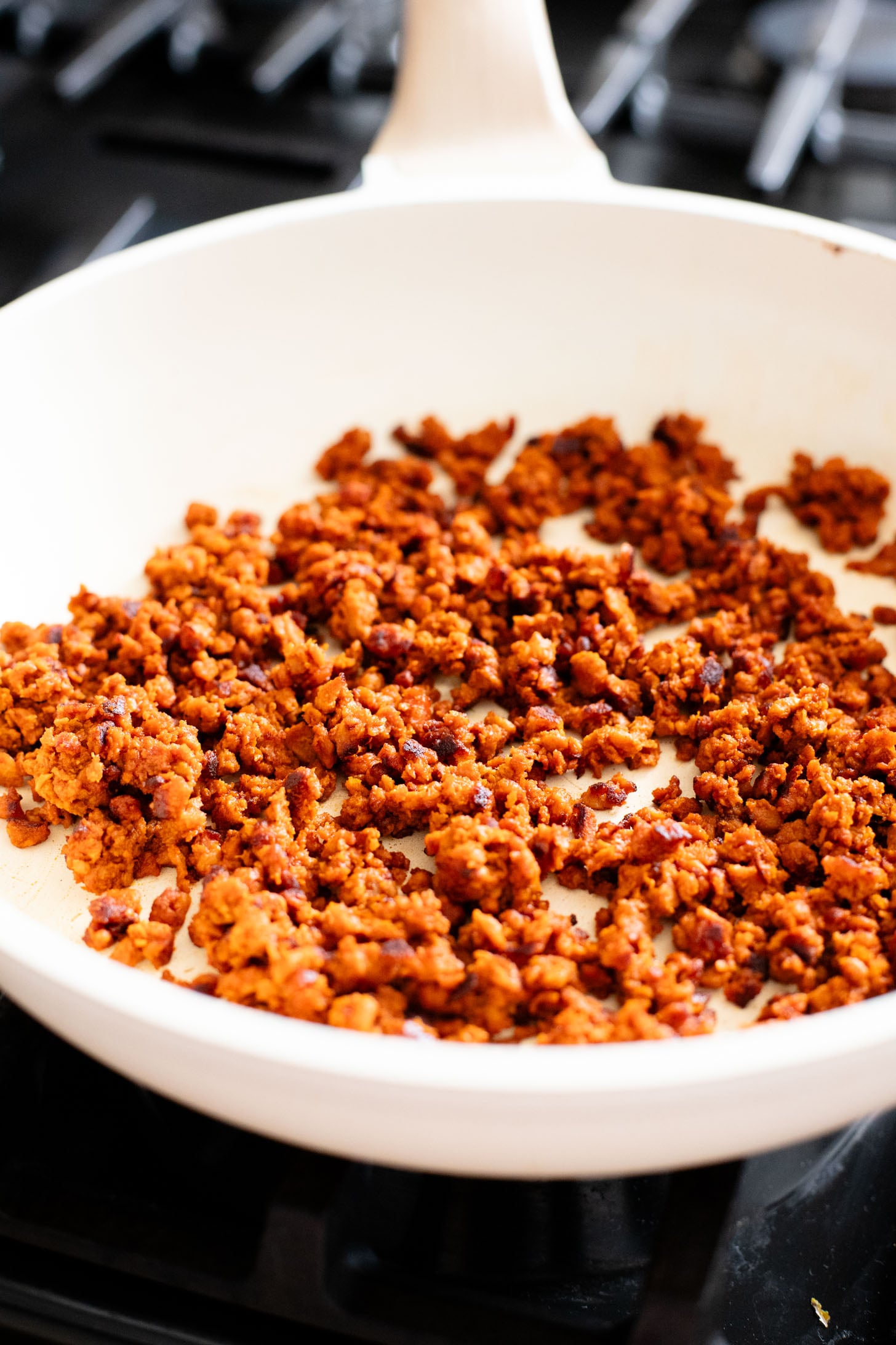 This Smoky Sweet Potatoes & Beans recipe is super versatile. Serve it as an easy sheet pan dinner or savory vegan brunch | ThisSavoryVegan.com