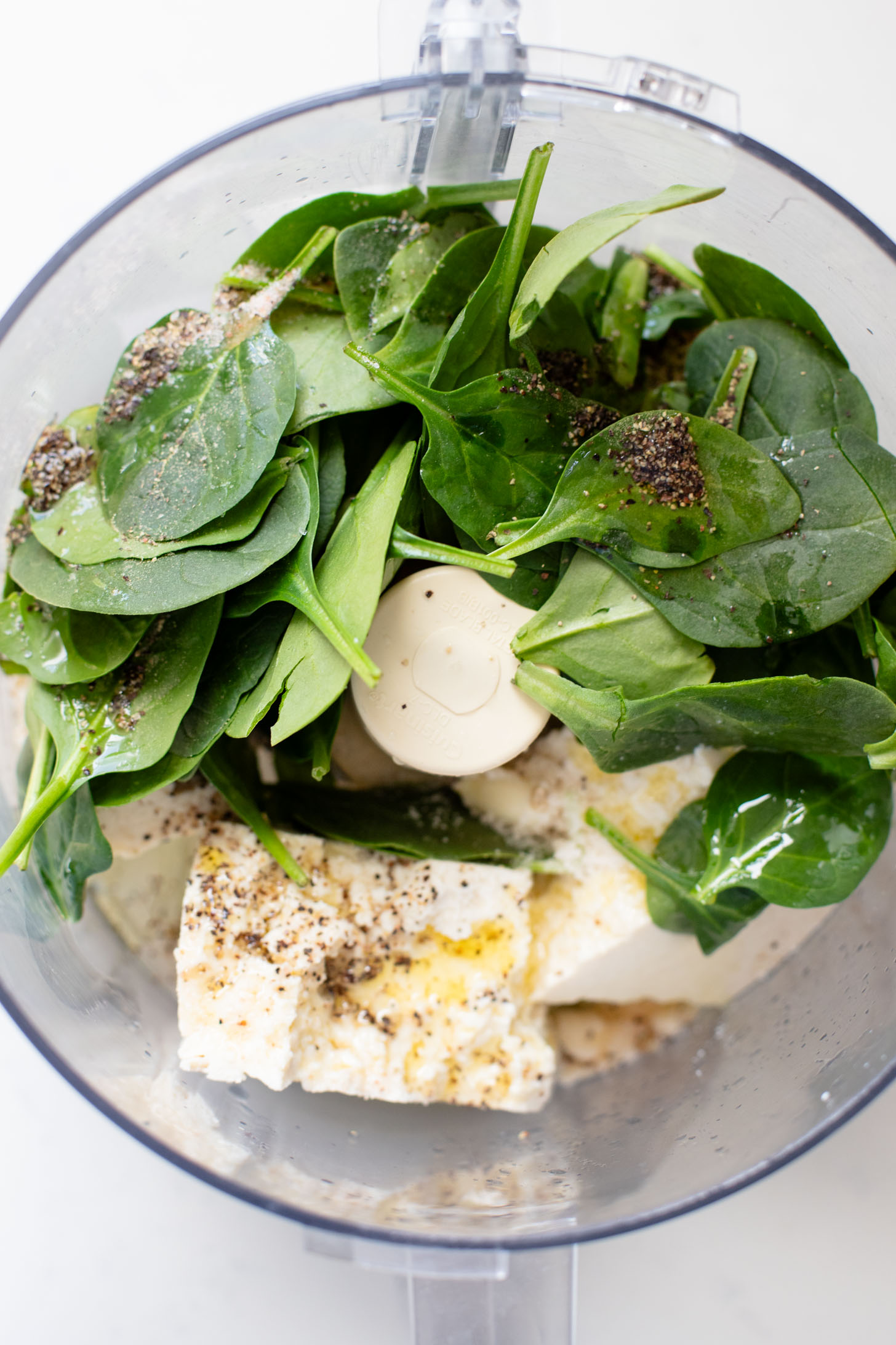 These Spinach Ricotta Tempeh Sandwiches are packed with protein & veggies. A super tasty homemade vegan sandwich recipe | ThisSavoryVegan.com