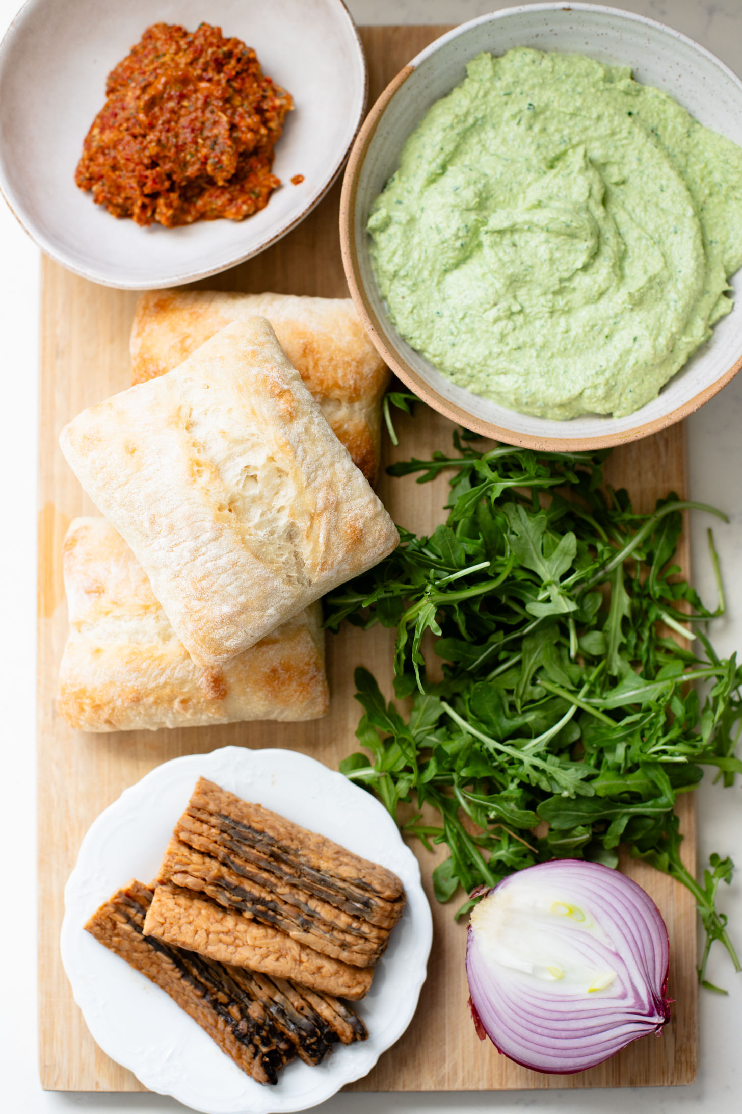 These Spinach Ricotta Tempeh Sandwiches are packed with protein & veggies. A super tasty homemade vegan sandwich recipe | ThisSavoryVegan.com