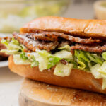 These Tempeh Bacon Caesar Salad Sandwiches have everything you could want in a vegan sandwich! So delicious & super easy | ThisSavoryVegan.com