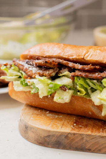 These Tempeh Bacon Caesar Salad Sandwiches have everything you could want in a vegan sandwich! So delicious & super easy | ThisSavoryVegan.com