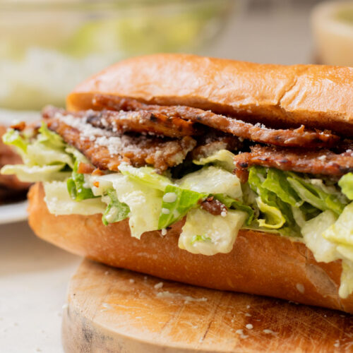 These Tempeh Bacon Caesar Salad Sandwiches have everything you could want in a vegan sandwich! So delicious & super easy | ThisSavoryVegan.com
