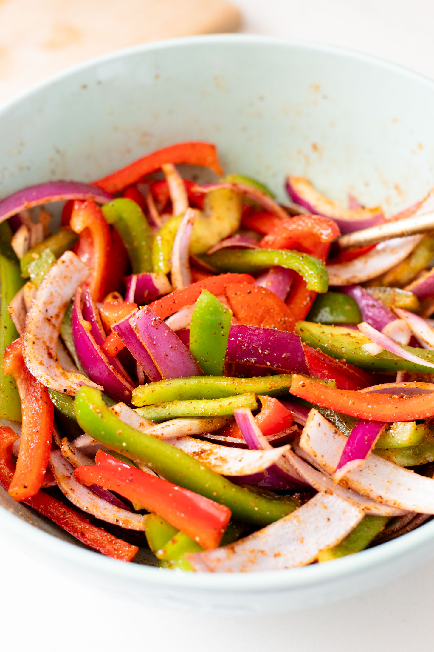 These Tofu Fajita Rice Bowls are a quick sheet pan dinner recipe! Packed with protein & veggies, and topped with avocado salsa | ThisSavoryVegan.com