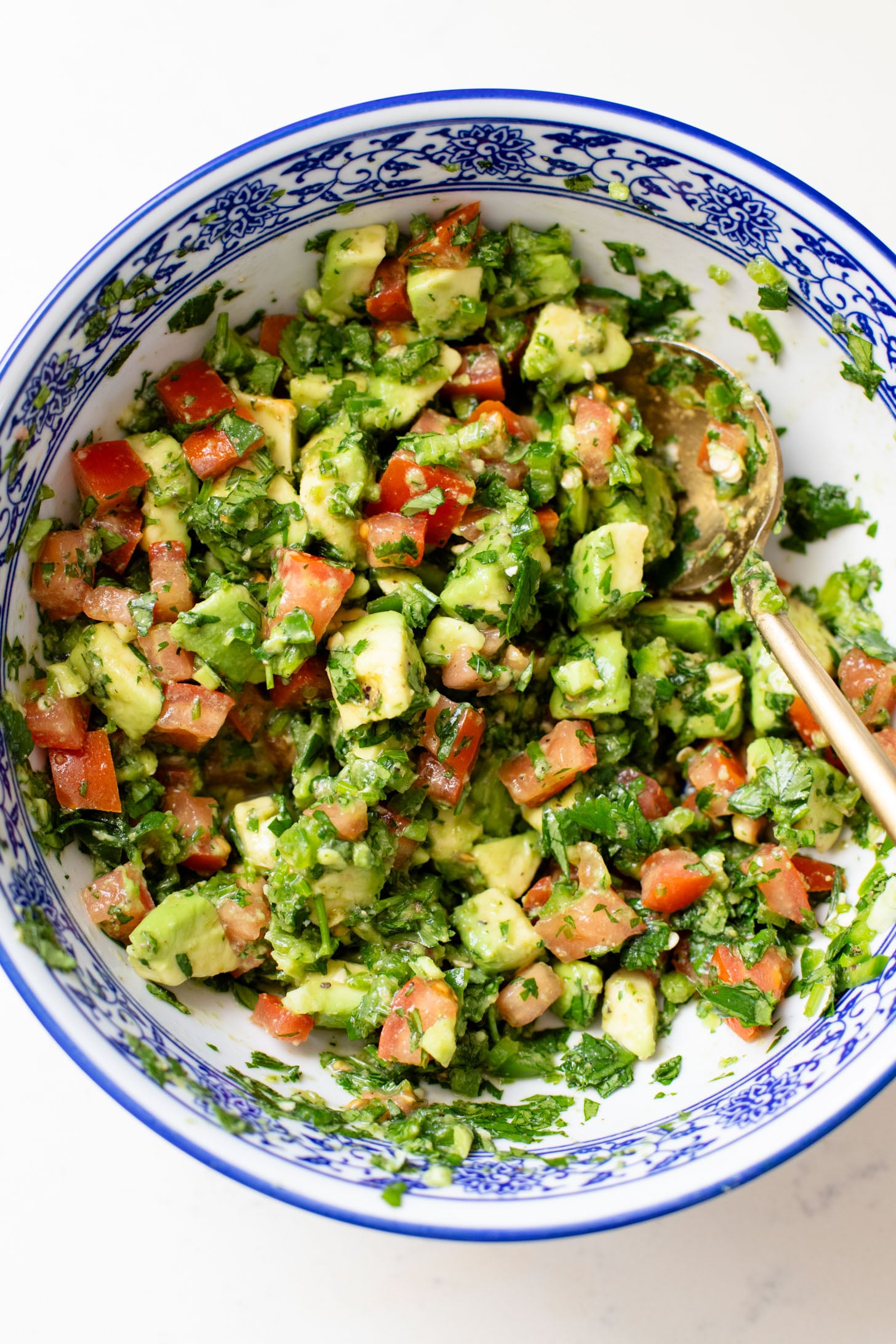 These Tofu Fajita Rice Bowls are a quick sheet pan dinner recipe! Packed with protein & veggies, and topped with avocado salsa | ThisSavoryVegan.com