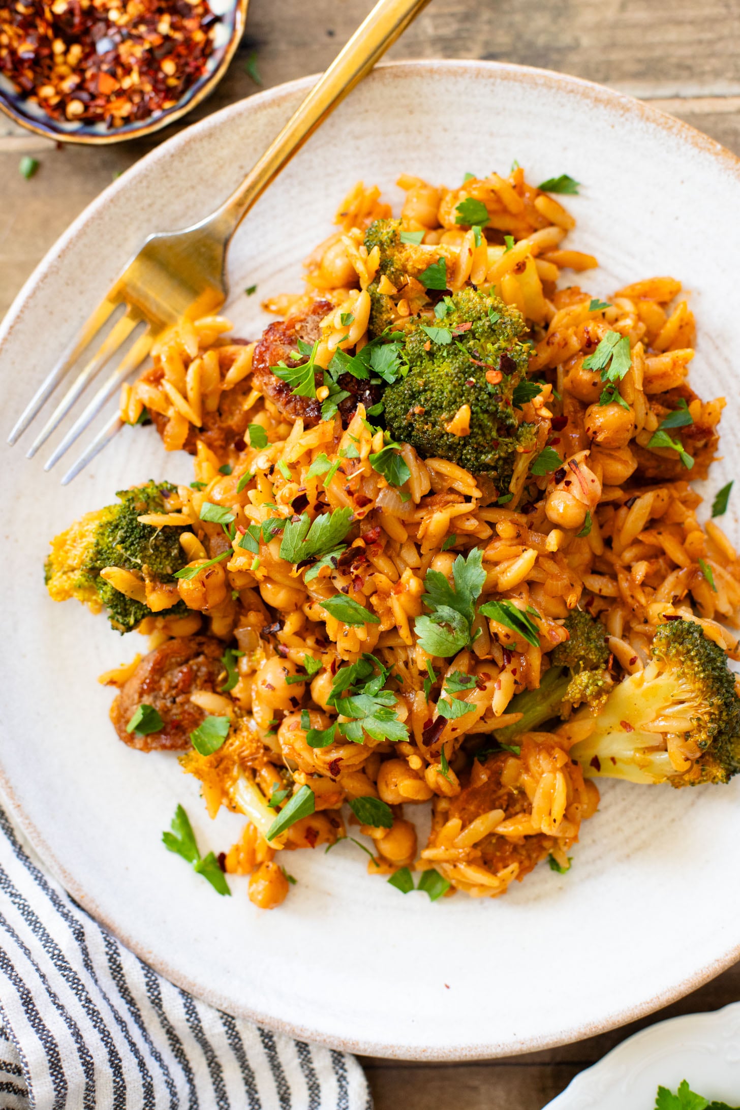 This Vegan Sausage & Broccoli Orzo Skillet is a one pot, vegan dinner that is ready in 40 minutes! Quick, easy & delicious | ThisSavoryVegan.com
