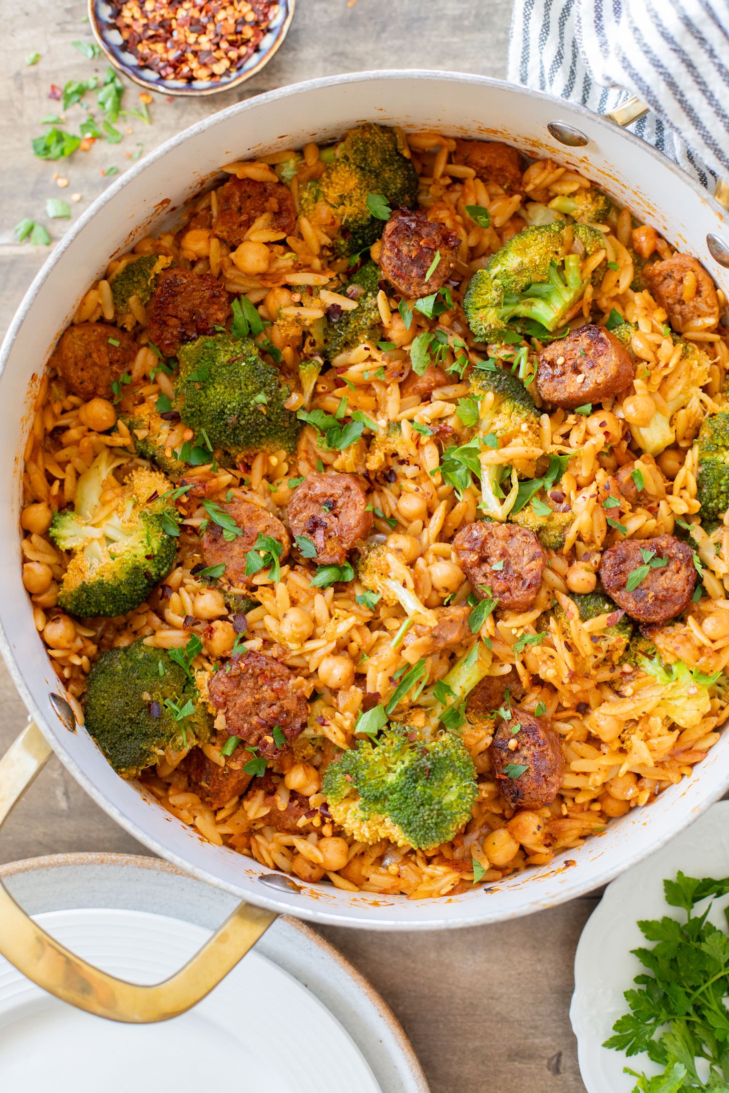 This Vegan Sausage & Broccoli Orzo Skillet is a one pot, vegan dinner that is ready in 40 minutes! Quick, easy & delicious | ThisSavoryVegan.com