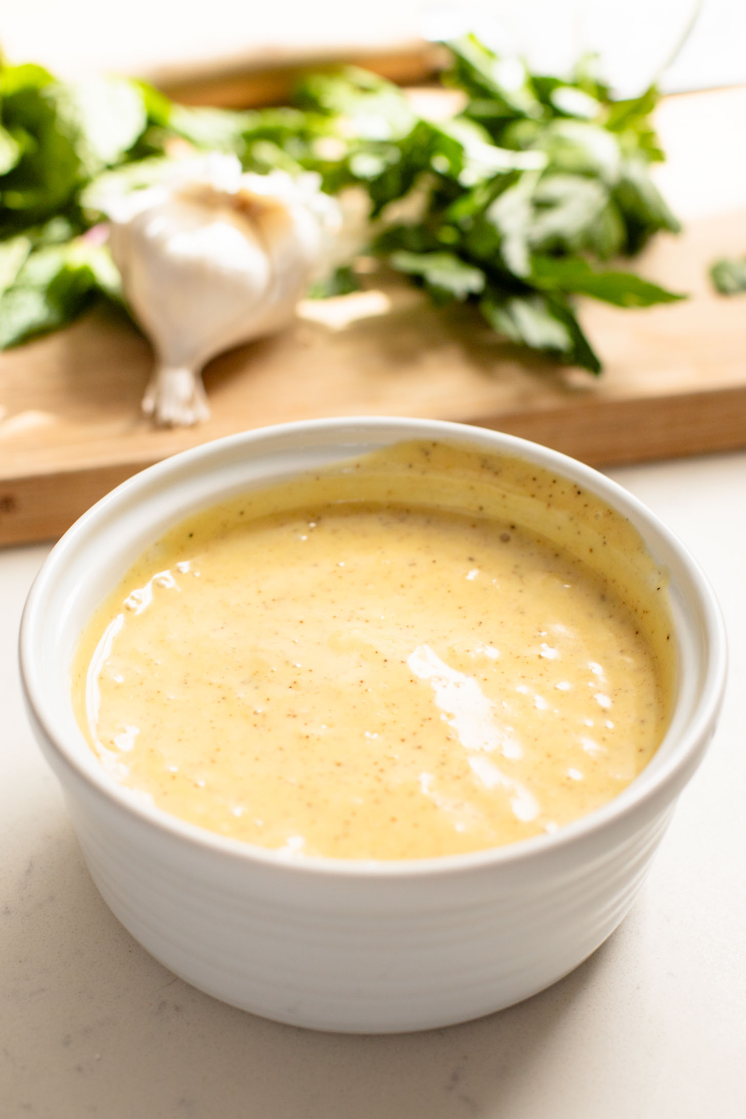 This Ginger & Herb Sweet Potato Quinoa Salad is a flavor bomb! Roasted sweet potatoes, tender quinoa, fresh herbs and the best ginger dressing | ThisSavoryVegan.com