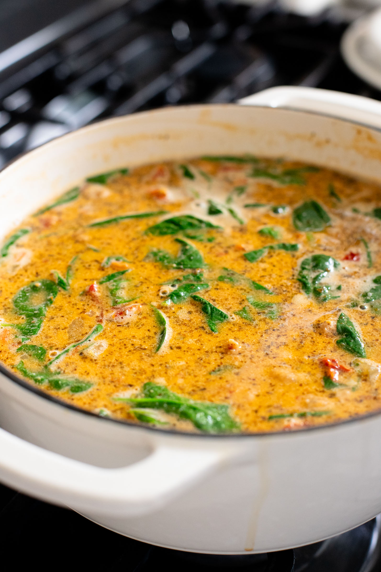 This Vegan White Bean & Sausage Soup is a creamy, hearty soup recipe that is cozy & perfect for serving a family | ThisSavoryVegan.com