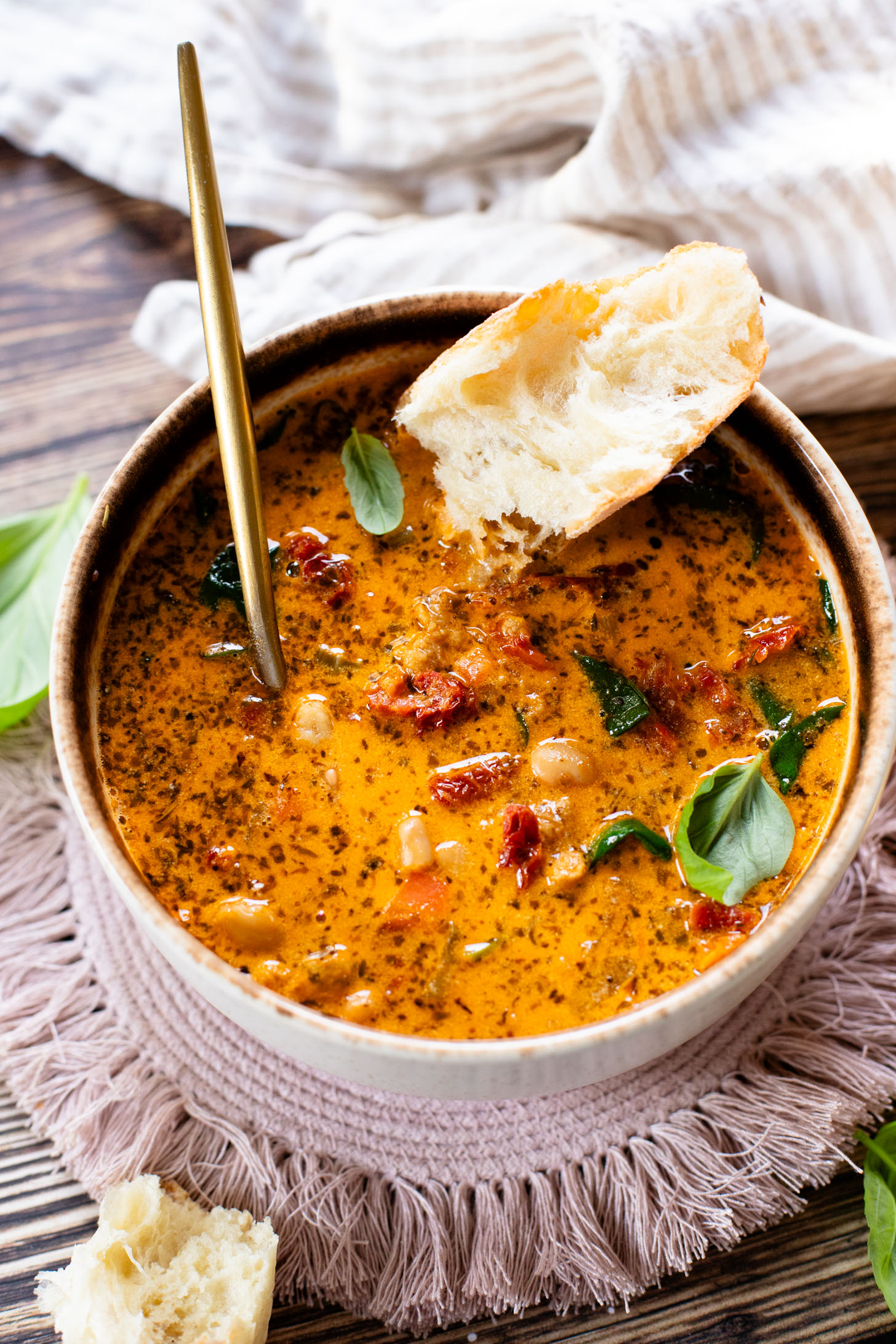This Vegan White Bean & Sausage Soup is a creamy, hearty soup recipe that is cozy & perfect for serving a family | ThisSavoryVegan.com