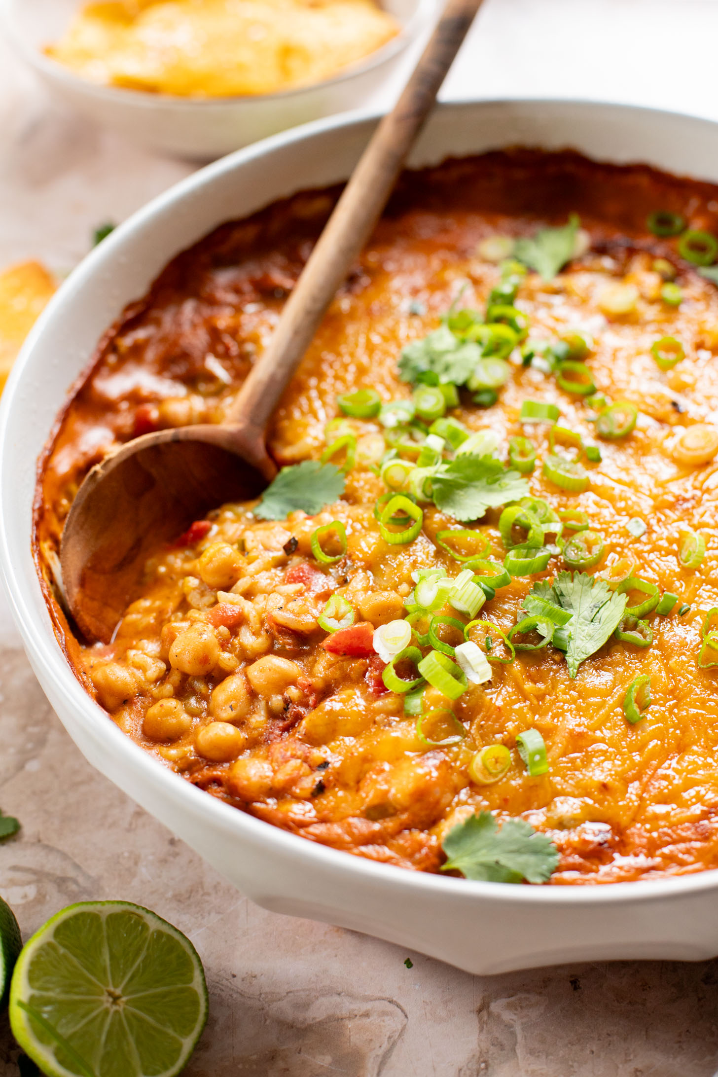 This Chickpea & Rice Enchilada Bake is a quick weeknight dinner that makes great leftover lunches. Super easy & delicious | ThisSavoryVegan.com