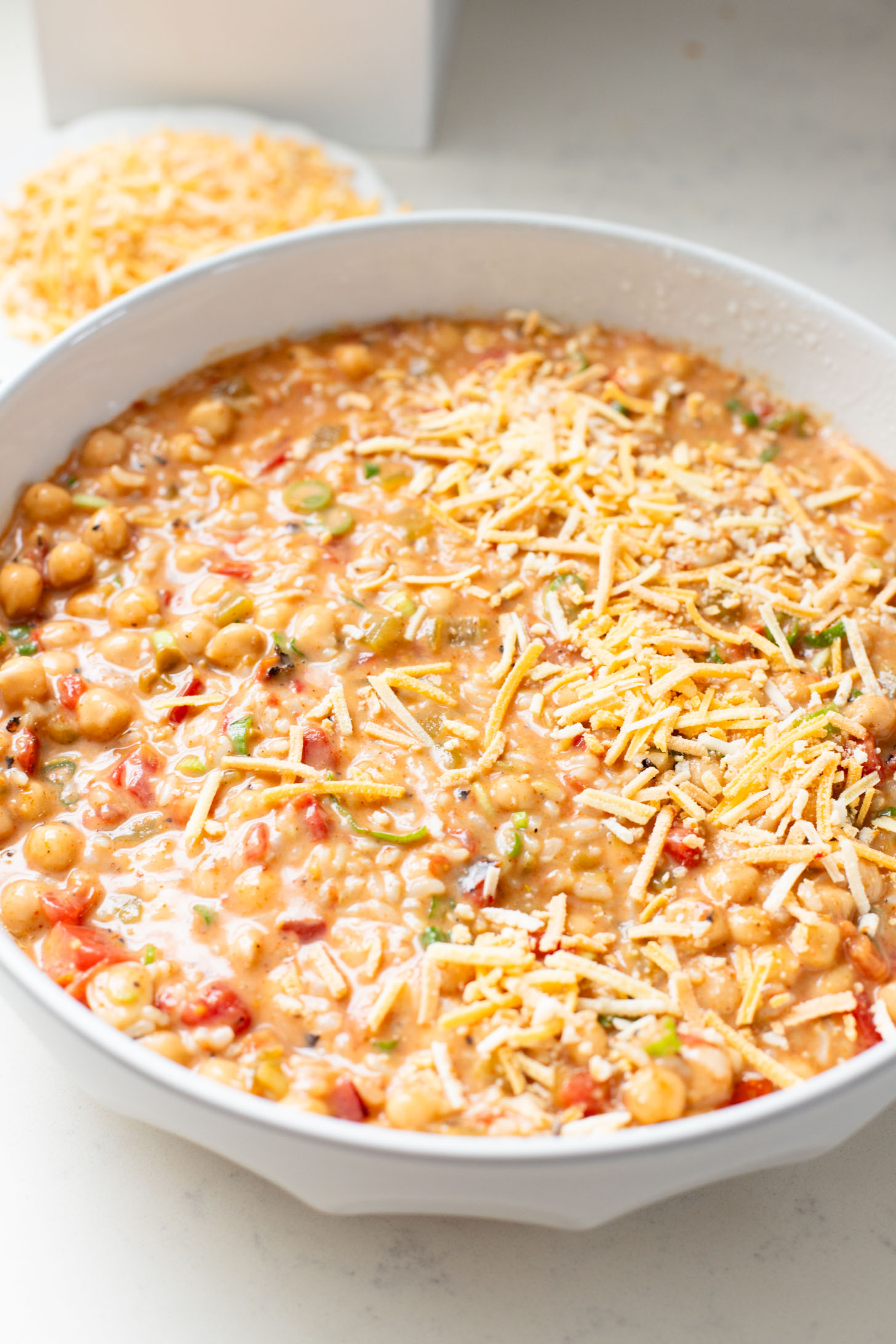 This Chickpea & Rice Enchilada Bake is a quick weeknight dinner that makes great leftover lunches. Super easy & delicious | ThisSavoryVegan.com