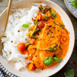 This Crispy Tofu in Roasted Red Pepper Sauce is a one-pot dinner that includes a delicious creamy sauce, tofu filets and greens | ThisSavoryVegan.com