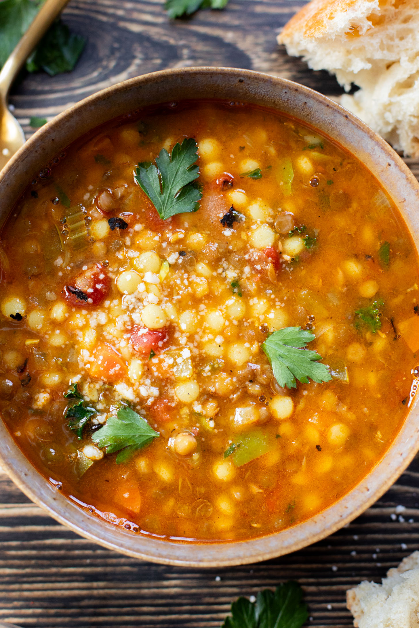 This Lentil & Couscous Soup is simple & veggie-packed! Ready in less than an hour and perfect for a cozy night at home | ThisSavoryVegan.com