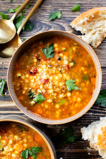This Lentil & Couscous Soup is simple & veggie-packed! Ready in less than an hour and perfect for a cozy night at home | ThisSavoryVegan.com