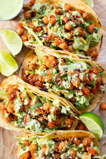 These Quick Chickpea Tacos are a weeknight staple! Made with a cilantro jalapeño slaw & super tasty chickpeas | ThisSavoryVegan.com