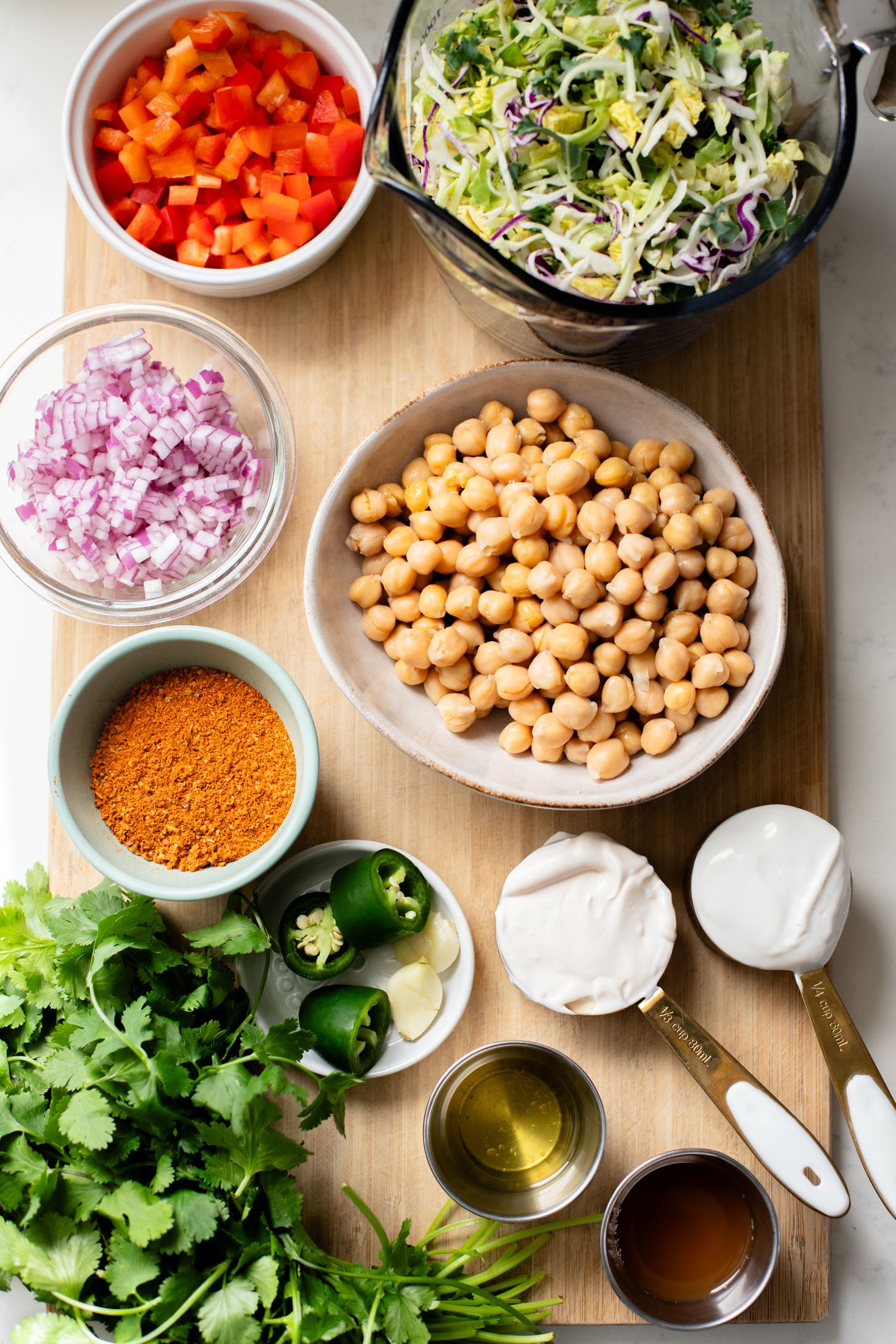 These Quick Chickpea Tacos are a weeknight staple! Made with a cilantro jalapeño slaw & super tasty chickpeas | ThisSavoryVegan.com