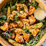 This Roasted Cauliflower Salad with Crispy Quinoa is super tasty & veggie-packed. Topped with the best vegan honey mustard dressing | ThisSavoryVegan.com