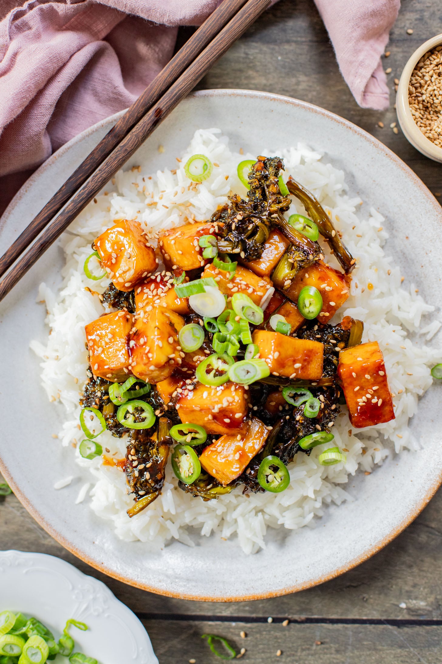 This Sticky Garlic Tofu is a simple weeknight dinner. Made with an agave garlic sauce & stir fried with broccolini | ThisSavoryVegan.com