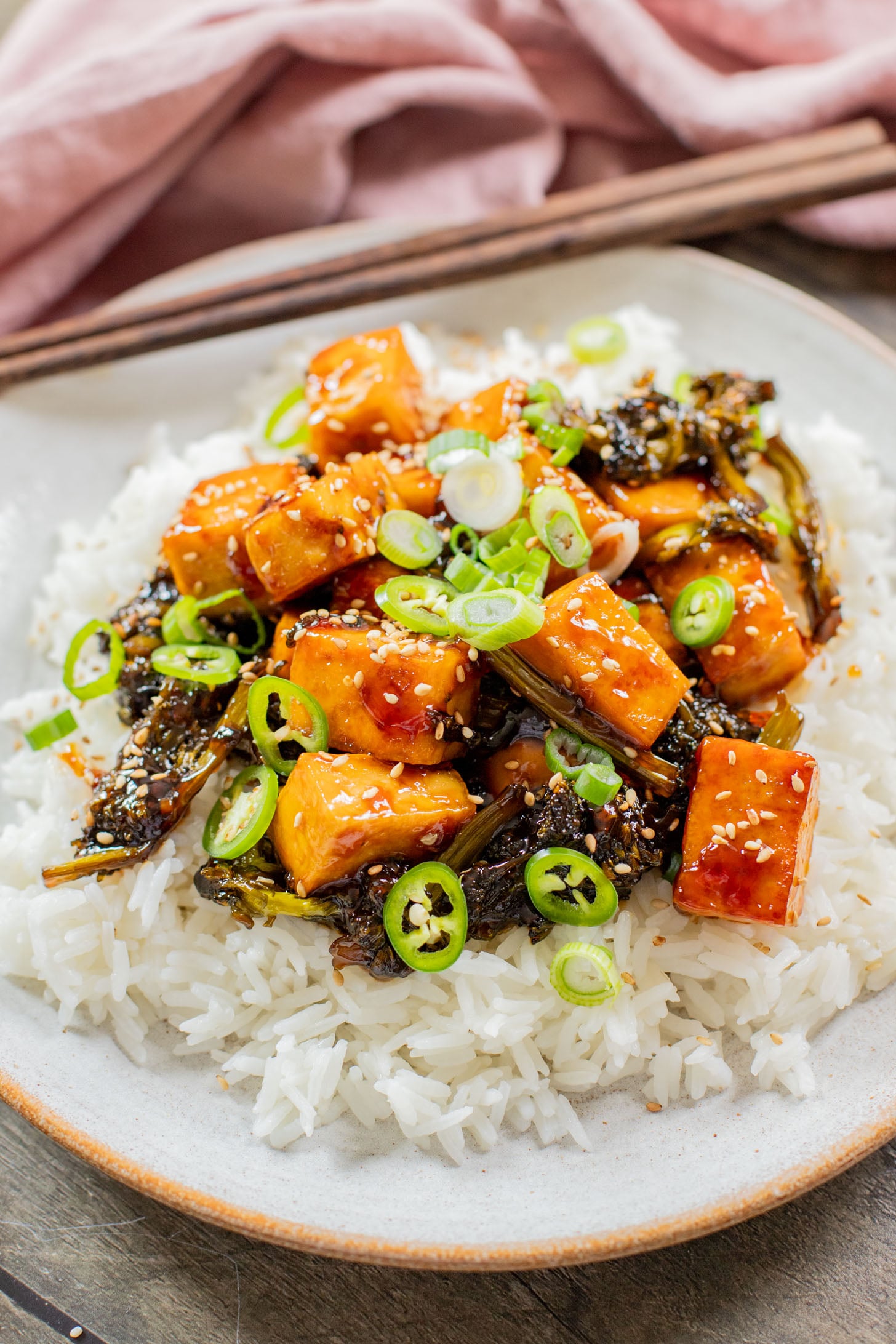 This Sticky Garlic Tofu is a simple weeknight dinner. Made with an agave garlic sauce & stir fried with broccolini | ThisSavoryVegan.com