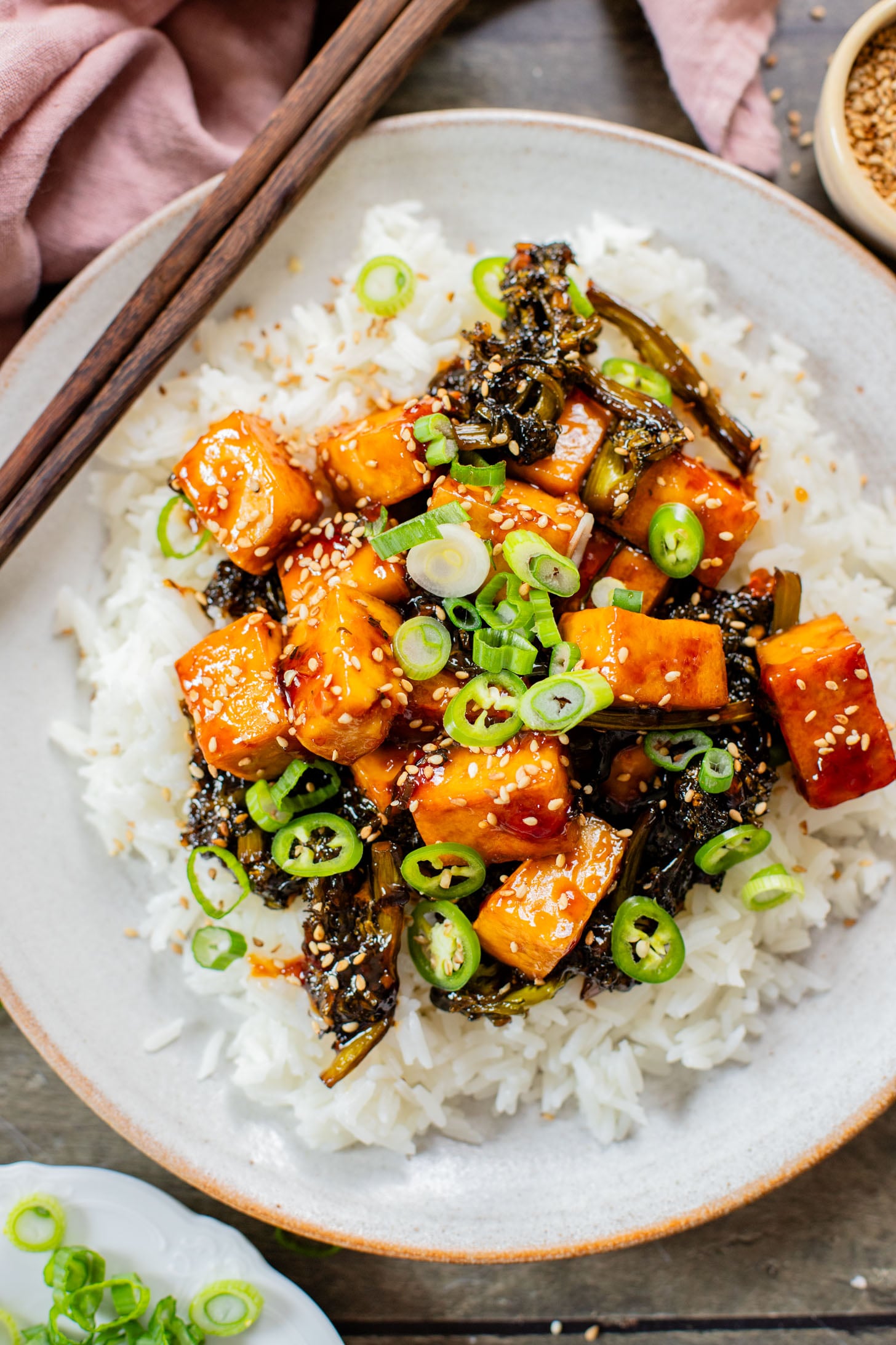 This Sticky Garlic Tofu is a simple weeknight dinner. Made with an agave garlic sauce & stir fried with broccolini | ThisSavoryVegan.com