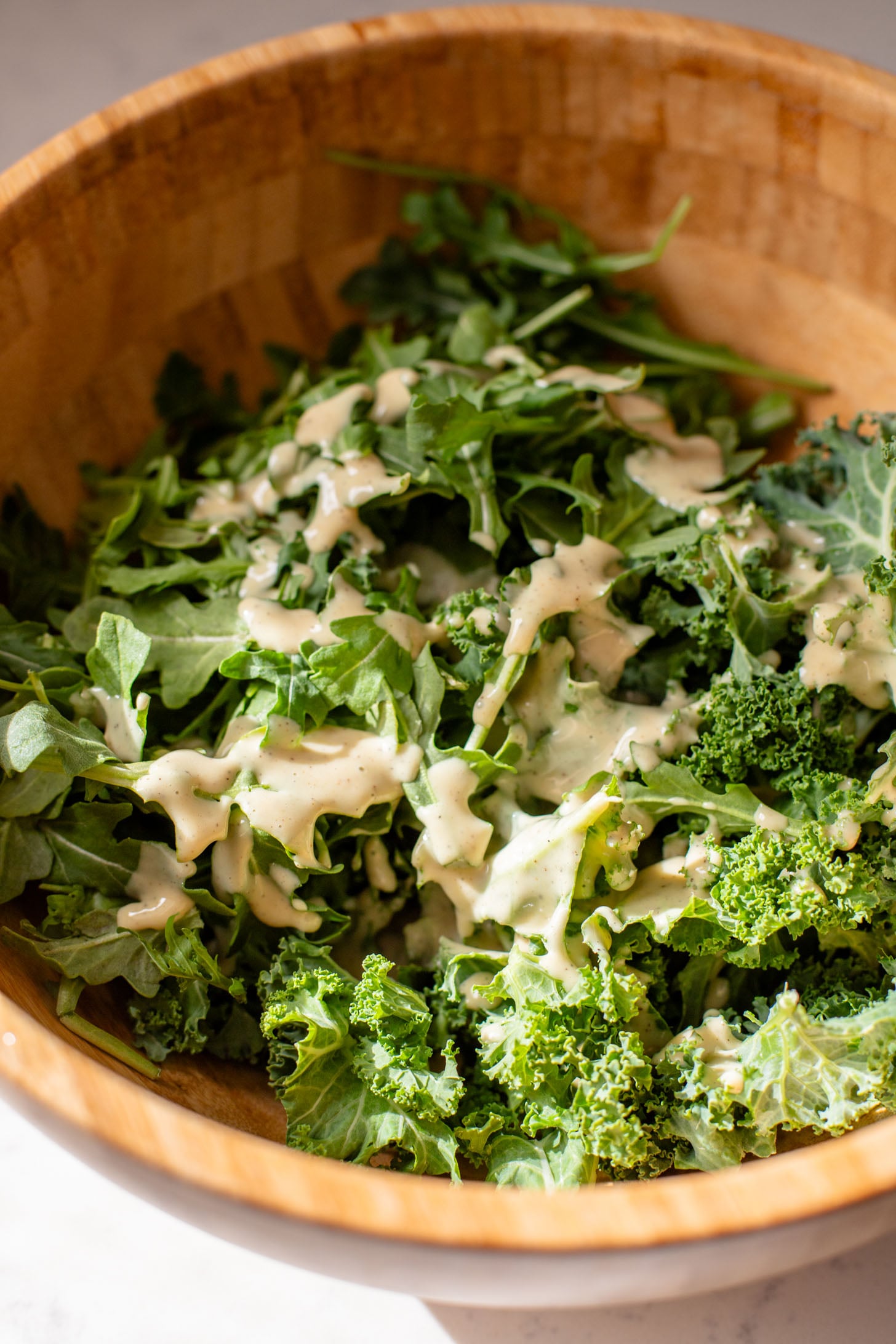 This Vegan Honey Mustard Dressing is the perfect simple & tangy dressing that can go with so many salads and wraps | ThisSavoryVegan.com