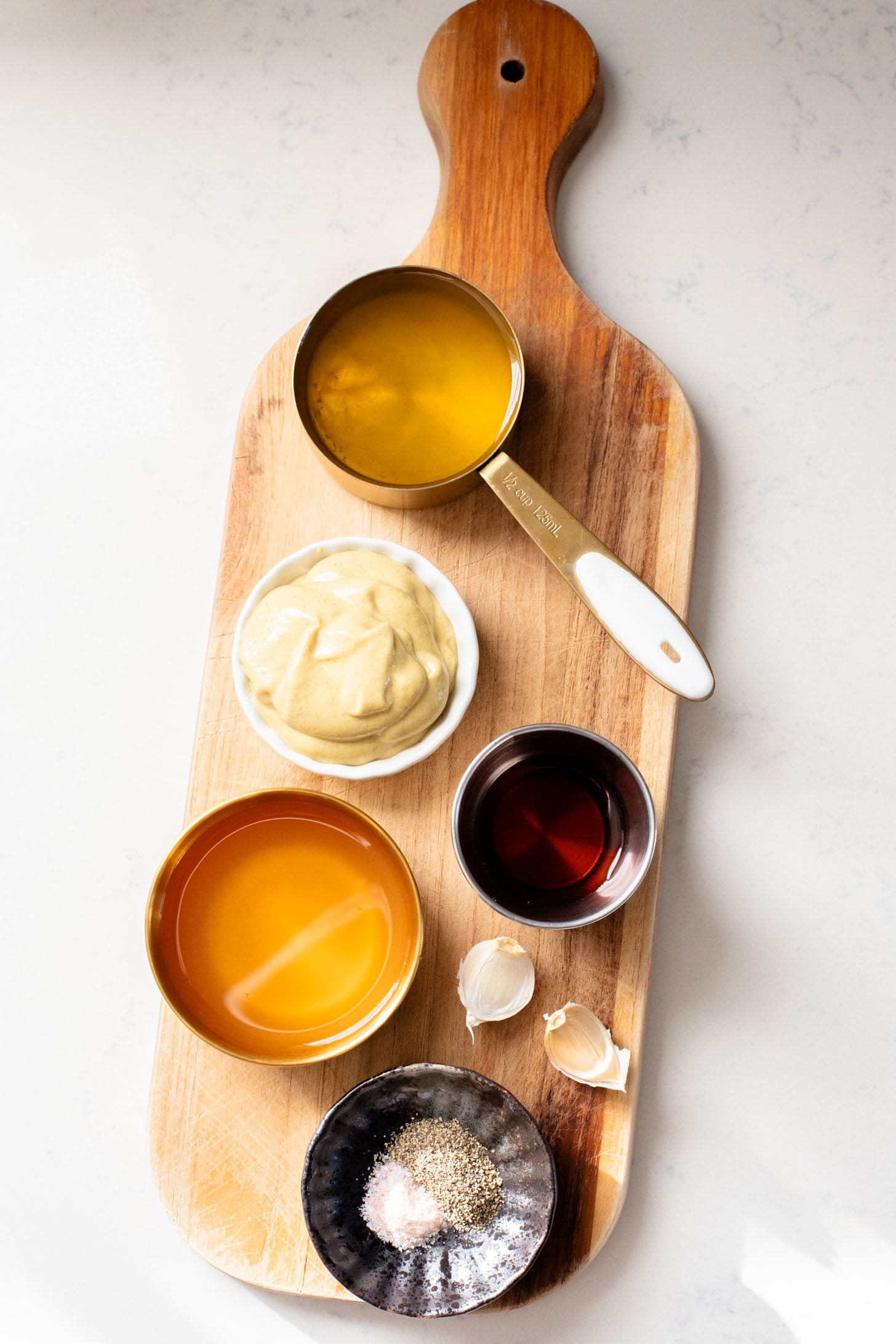 This Vegan Honey Mustard Dressing is the perfect simple & tangy dressing that can go with so many salads and wraps | ThisSavoryVegan.com