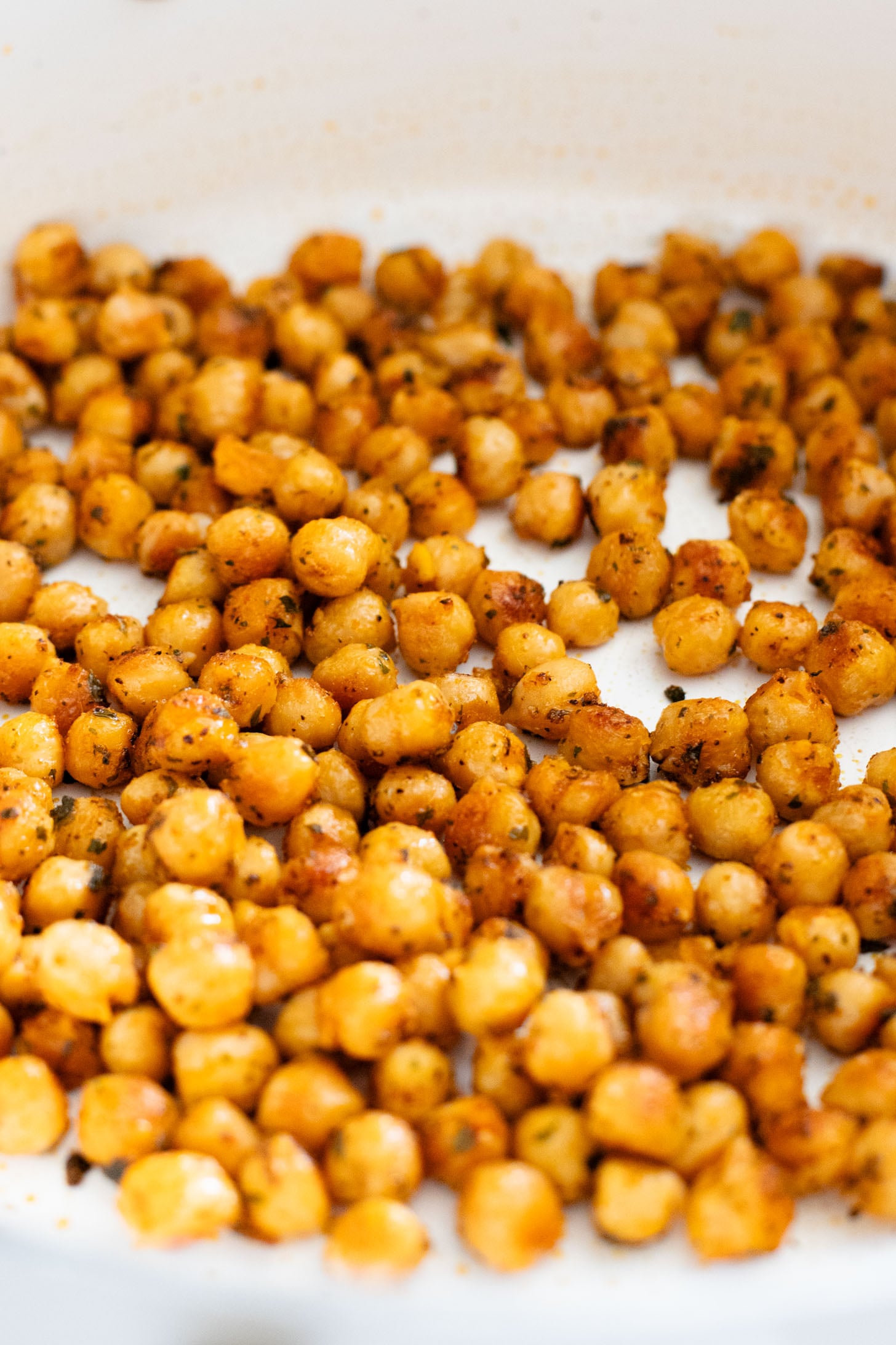 This Creamy Tuscan Chickpeas & Orzo recipe is a quick one-pot vegan dinner! Perfect meal when you want something comforting and easy | ThisSavoryVegan.com