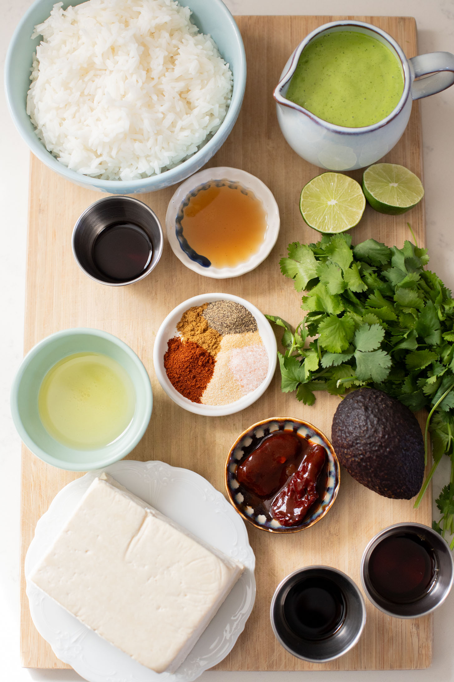 This Crispy Rice Salad with Chipotle Tofu is a vegan dinner that doesn't skimp on flavor. Served with a creamy cilantro dressing | ThisSavoryVegan.com