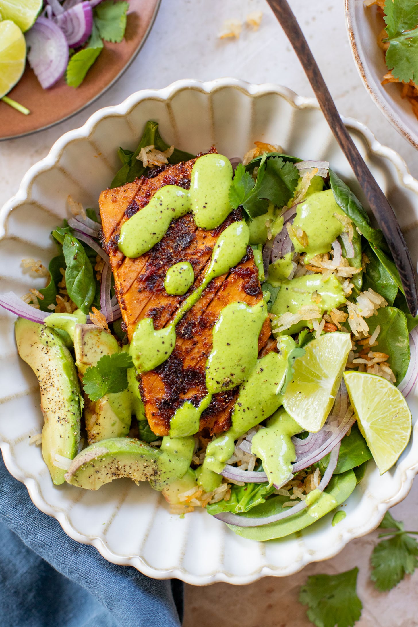 This Crispy Rice Salad with Chipotle Tofu is a vegan dinner that doesn't skimp on flavor. Served with a creamy cilantro dressing | ThisSavoryVegan.com
