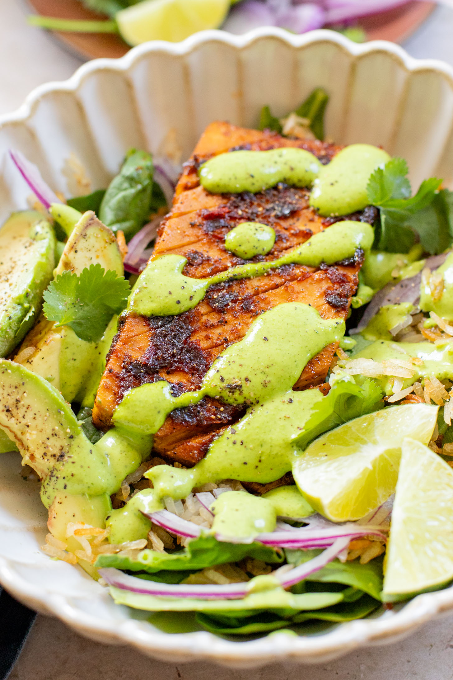 This Crispy Rice Salad with Chipotle Tofu is a vegan dinner that doesn't skimp on flavor. Served with a creamy cilantro dressing | ThisSavoryVegan.com
