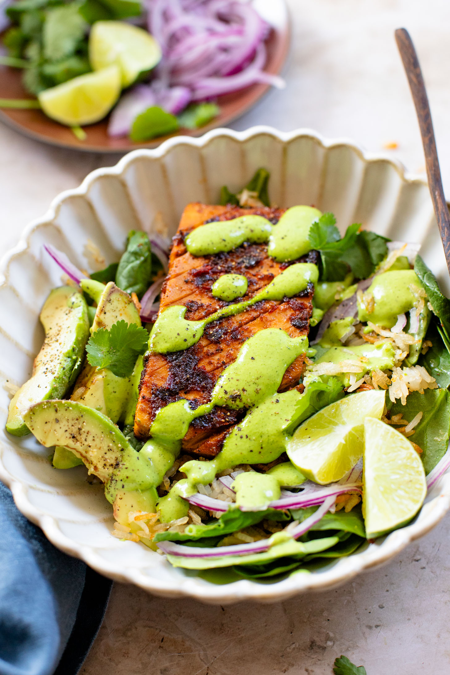 This Crispy Rice Salad with Chipotle Tofu is a vegan dinner that doesn't skimp on flavor. Served with a creamy cilantro dressing | ThisSavoryVegan.com