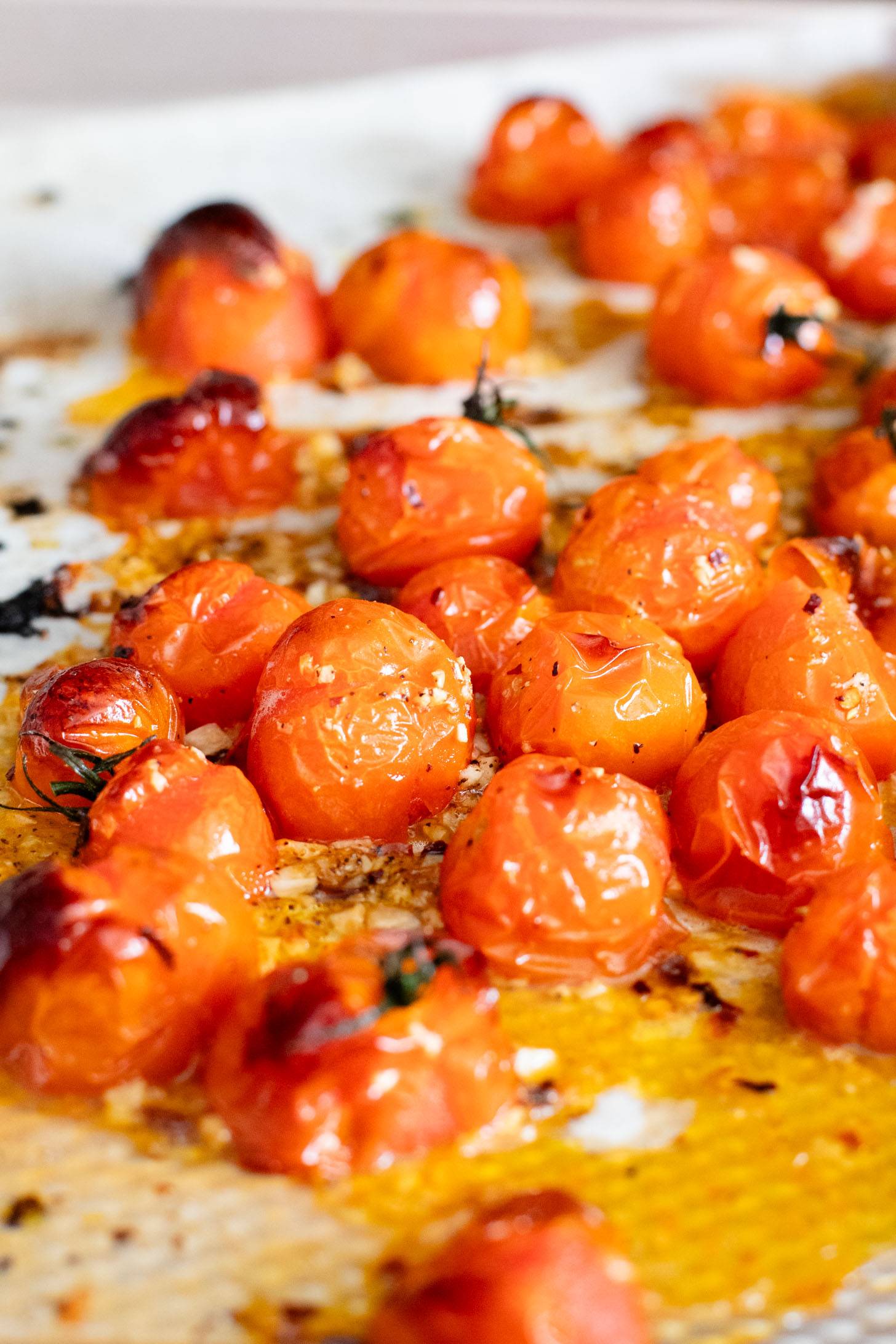 These Roasted Tomato & Ricotta Crostini are the best dairy-free appetizer! Bread slices are topped with vegan parm, tofu ricotta & burst tomatoes | ThisSavoryVegan.com