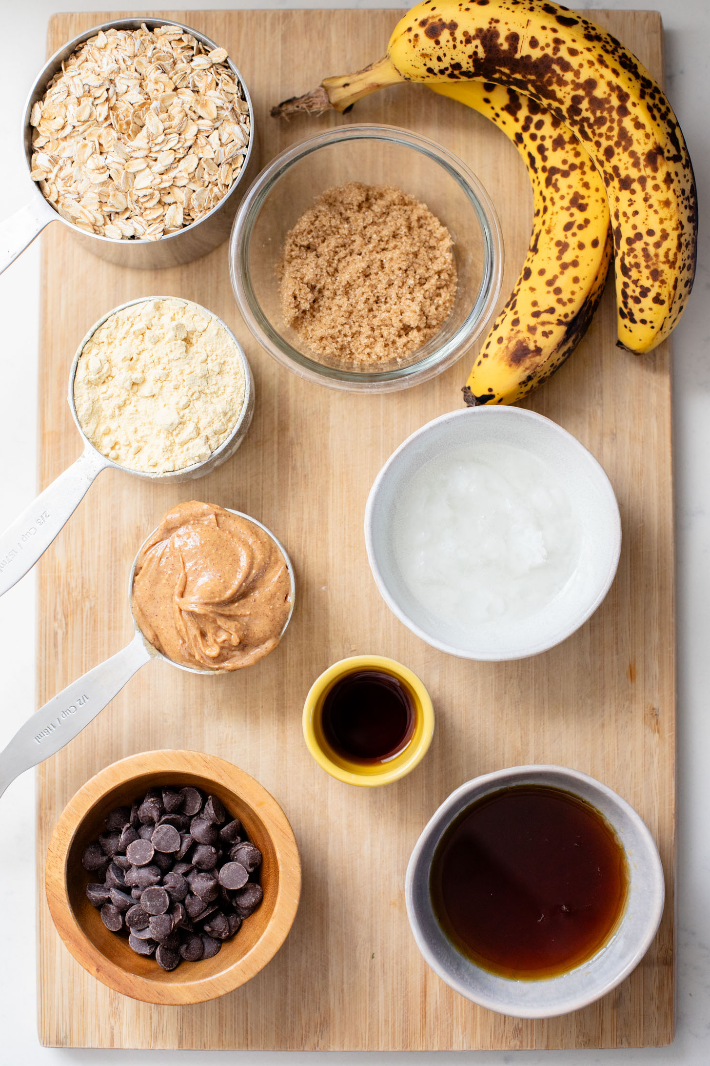 These Vegan Protein Oat Bars are the perfect snack or dessert for the novice baker. Nothing fancy, just a tasty dairy-free treat | ThisSavoryVegan.com