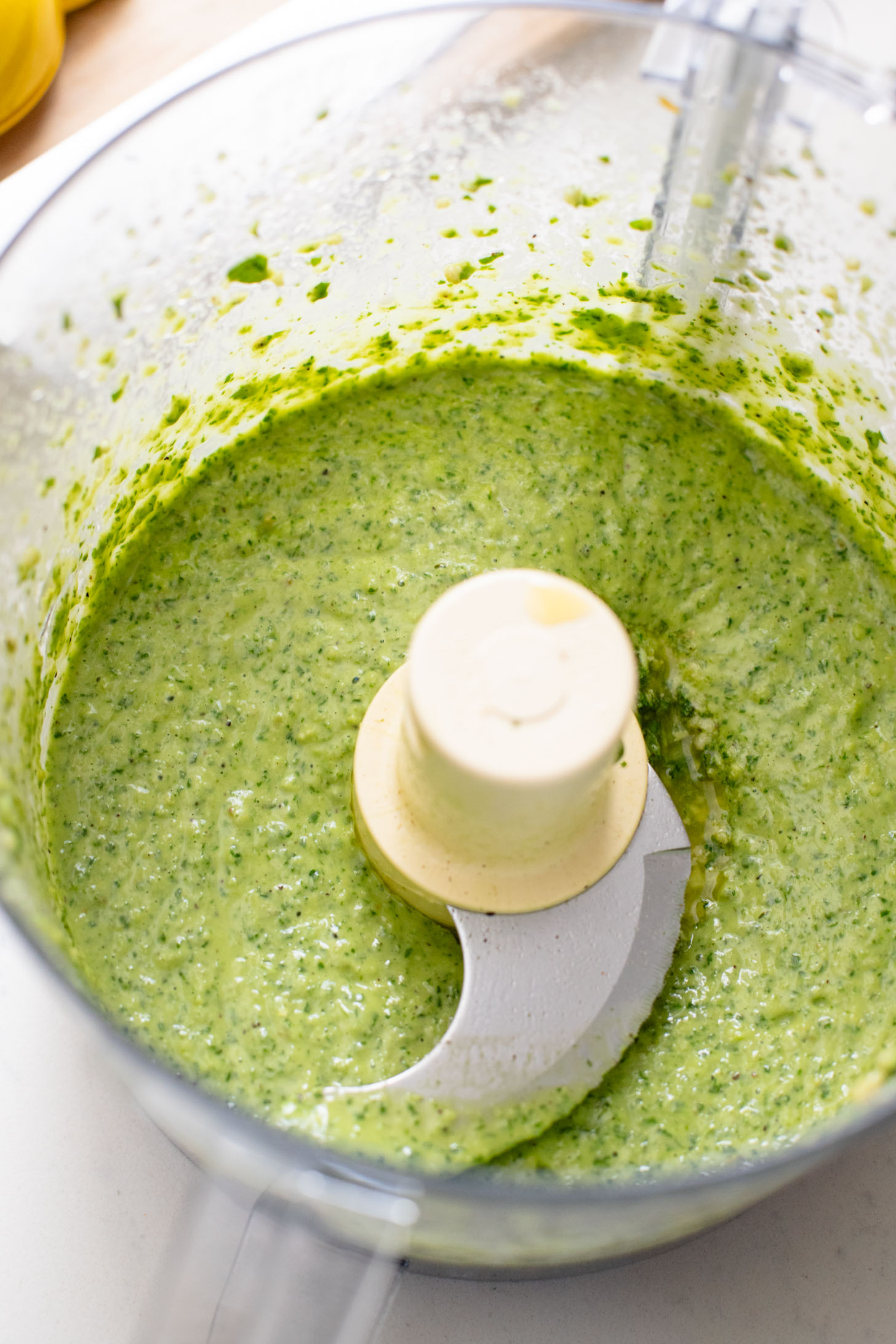 This Arugula Pesto Rigatoni is dairy-free and delicious. Arugula adds a peppery bite to the basil pesto. A quick & easy vegan dinner | ThisSavoryVegan.com