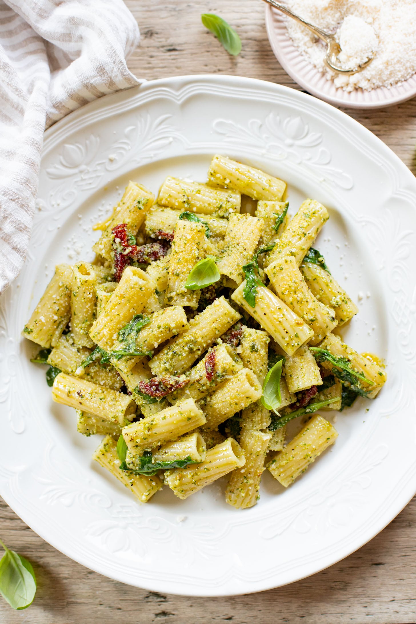 This Arugula Pesto Rigatoni is dairy-free and delicious. Arugula adds a peppery bite to the basil pesto. A quick & easy vegan dinner | ThisSavoryVegan.com