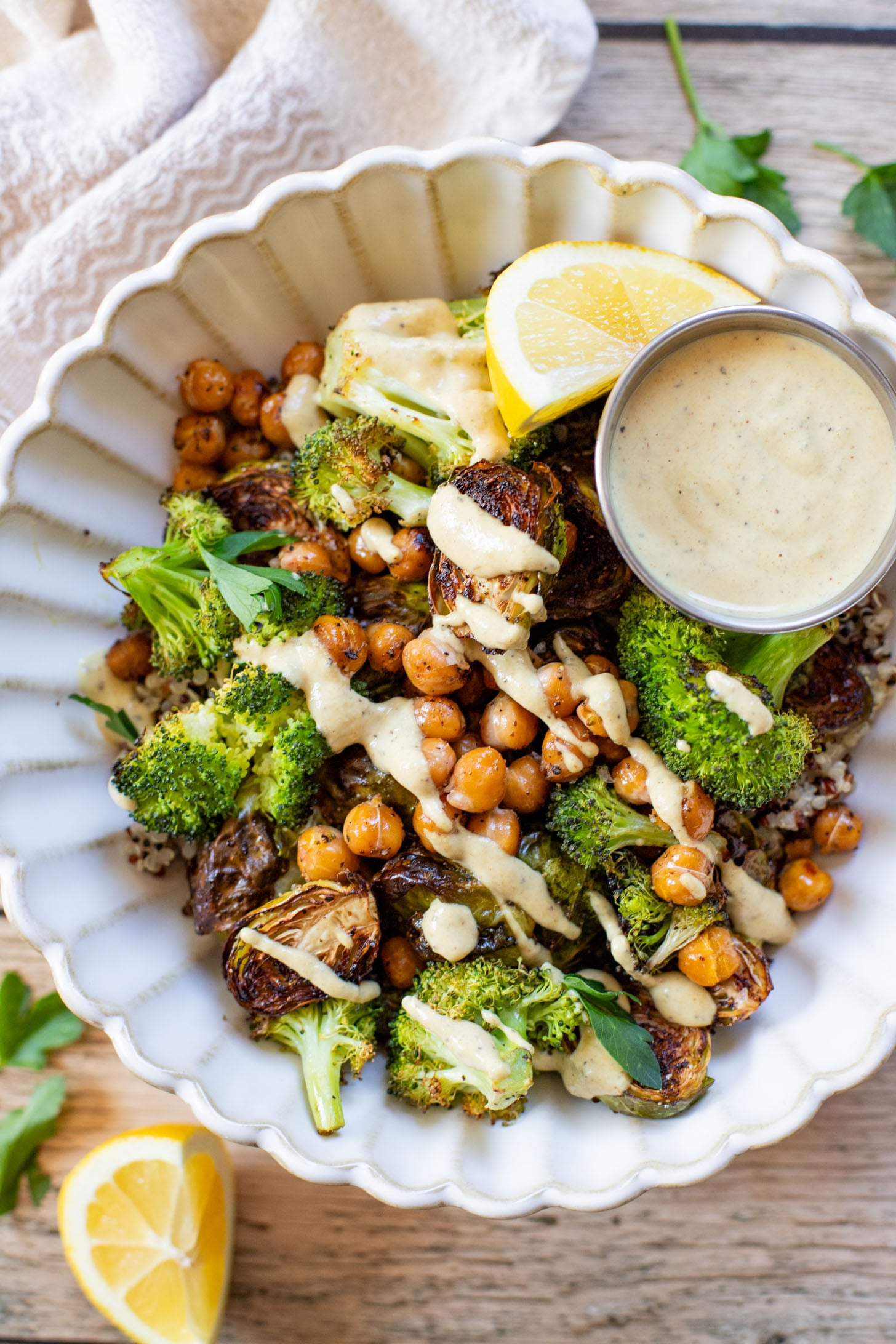 These Roasted Veggie Quinoa Bowls make the best vegan lunch or dinner! Topped with a mustard tahini dressing for the perfect bite | ThisSavoryVegan.com