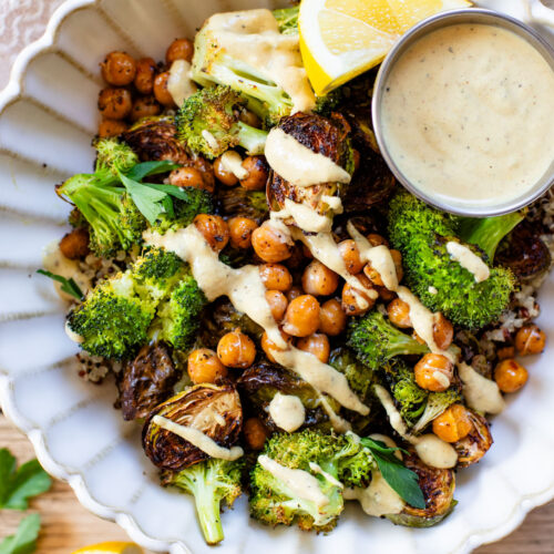 These Roasted Veggie Quinoa Bowls make the best vegan lunch or dinner! Topped with a mustard tahini dressing for the perfect bite | ThisSavoryVegan.com