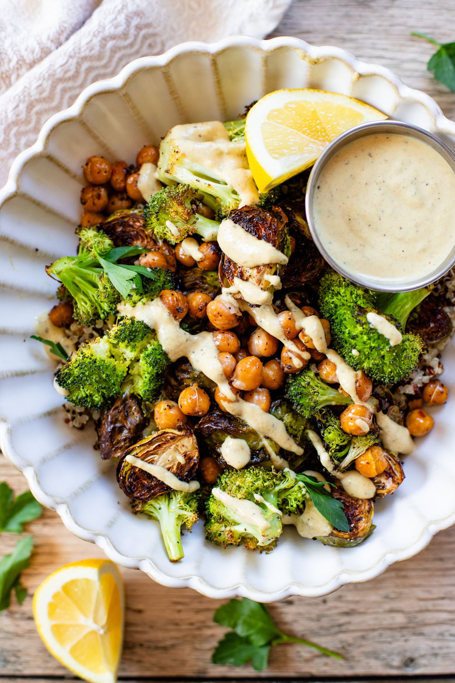 These Roasted Veggie Quinoa Bowls make the best vegan lunch or dinner! Topped with a mustard tahini dressing for the perfect bite | ThisSavoryVegan.com