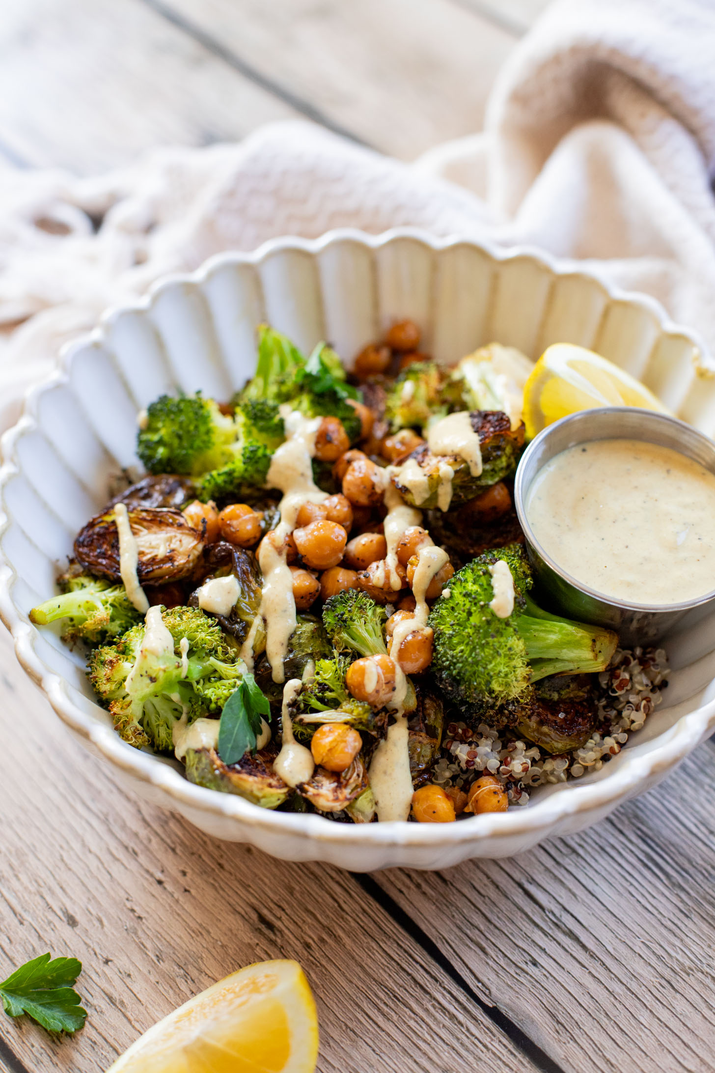 These Roasted Veggie Quinoa Bowls make the best vegan lunch or dinner! Topped with a mustard tahini dressing for the perfect bite | ThisSavoryVegan.com