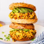 These Tofu Scramble Breakfast Sandwiches are perfect for a weekend brunch at home. This is the best vegan breakfast bagel | ThisSavoryVegan.com